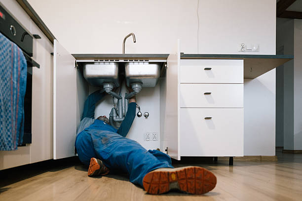 Professional Drain Cleaning technician working in Marine, IL